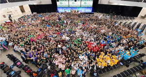 The image shows the attendees at the iGEM 2015 Jamboree. Used with permission from the iGEM Foundation